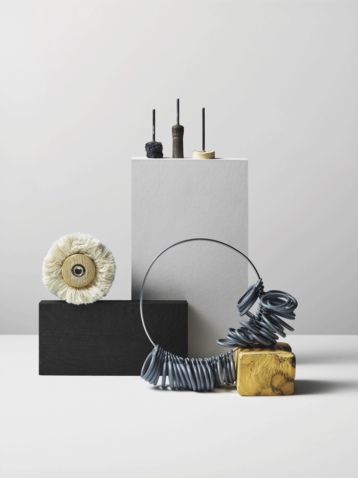 Goldsmith tools on white background