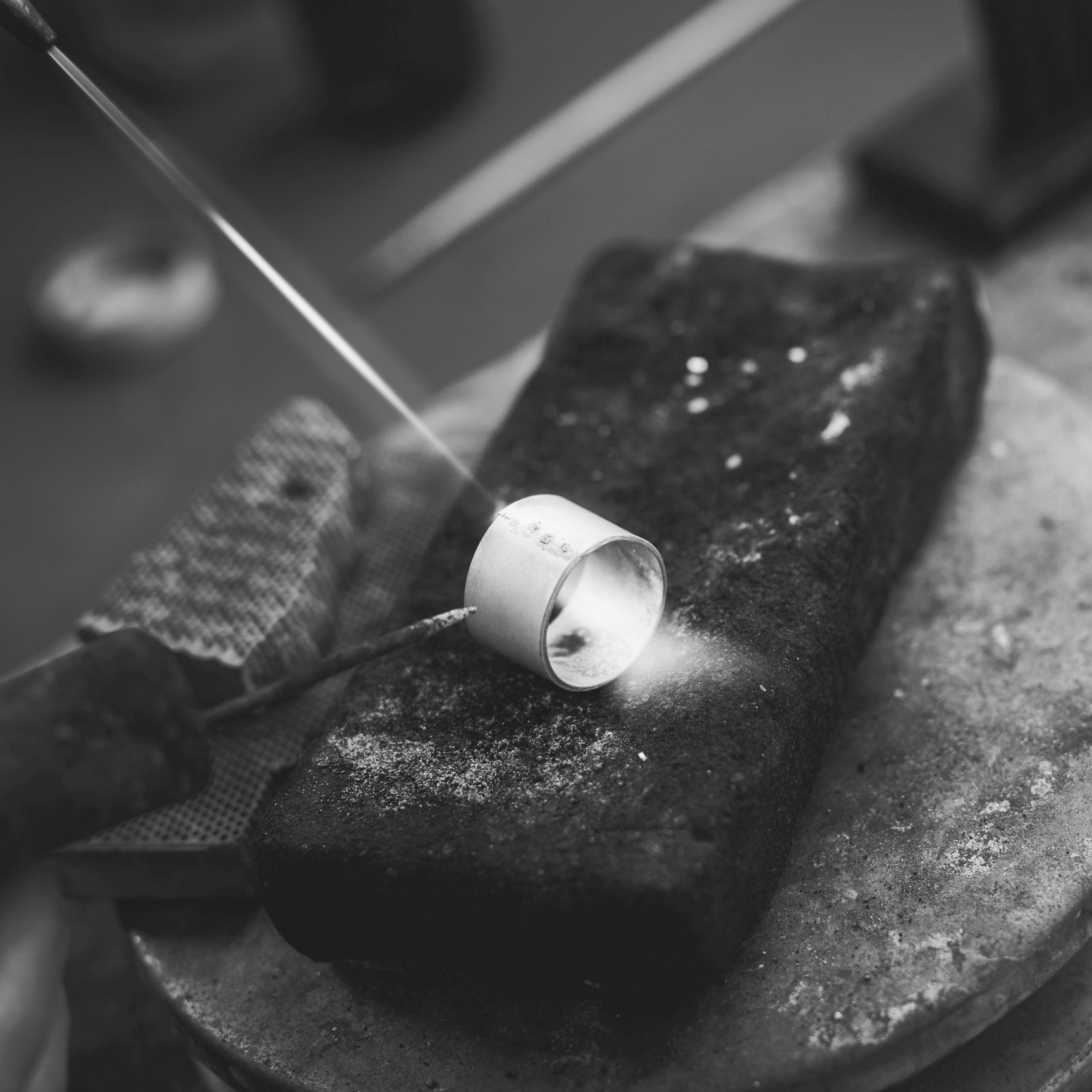 Ring being worked on a stone