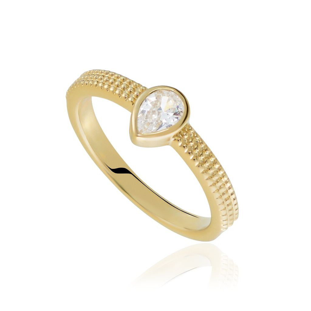 Gold ring with a diamond on a white background