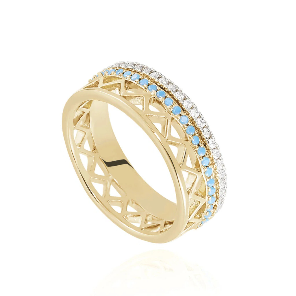 Gold ring with turquoise and white diamonds on a white background