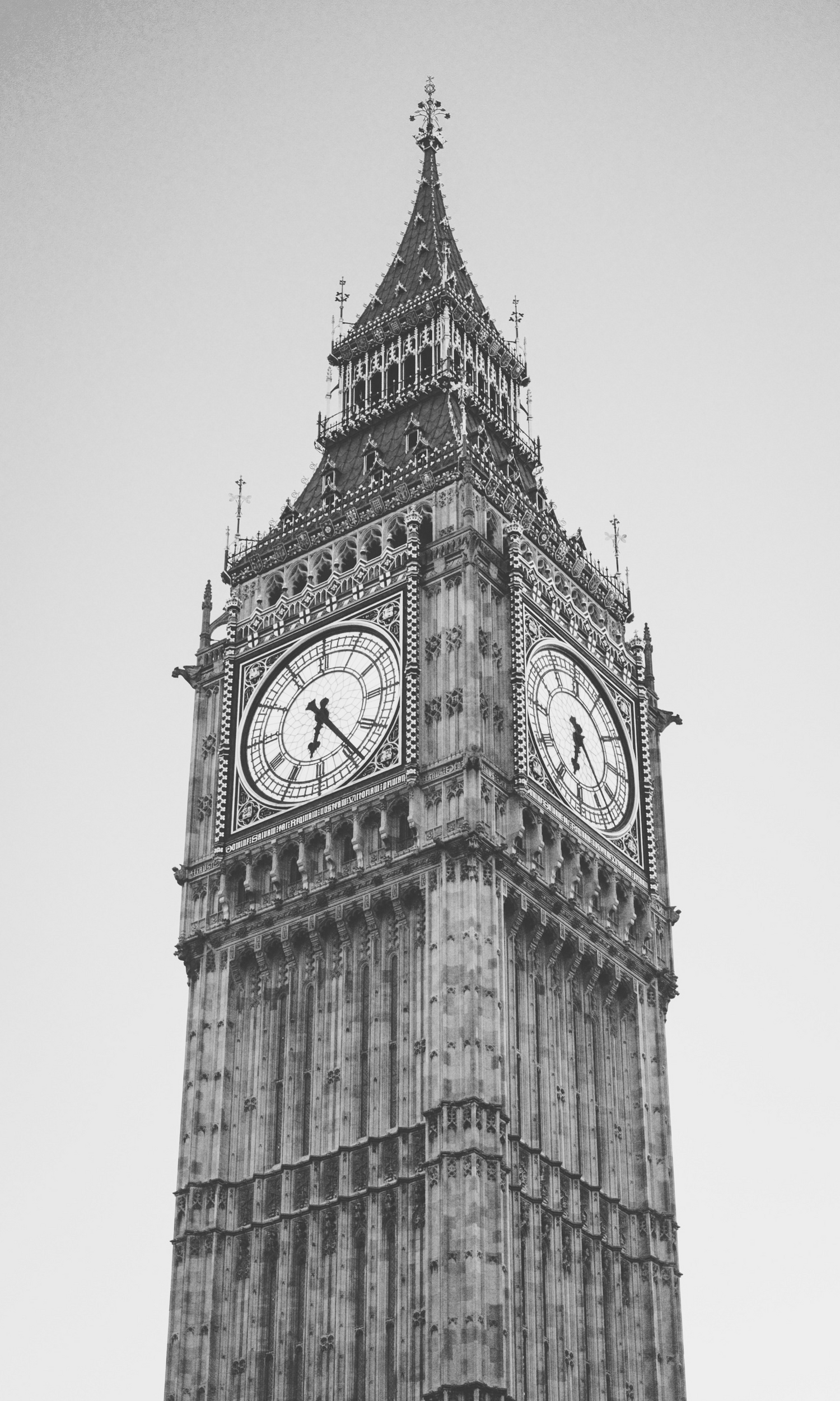Black and white photo of the Big Ben clock tower against a light background