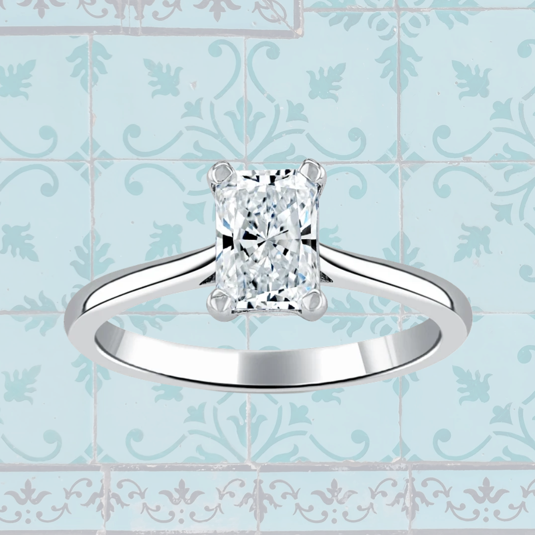 Hafeez Jewellery London Musk 18k white gold emerald diamond solitaire engagement ring - pattern