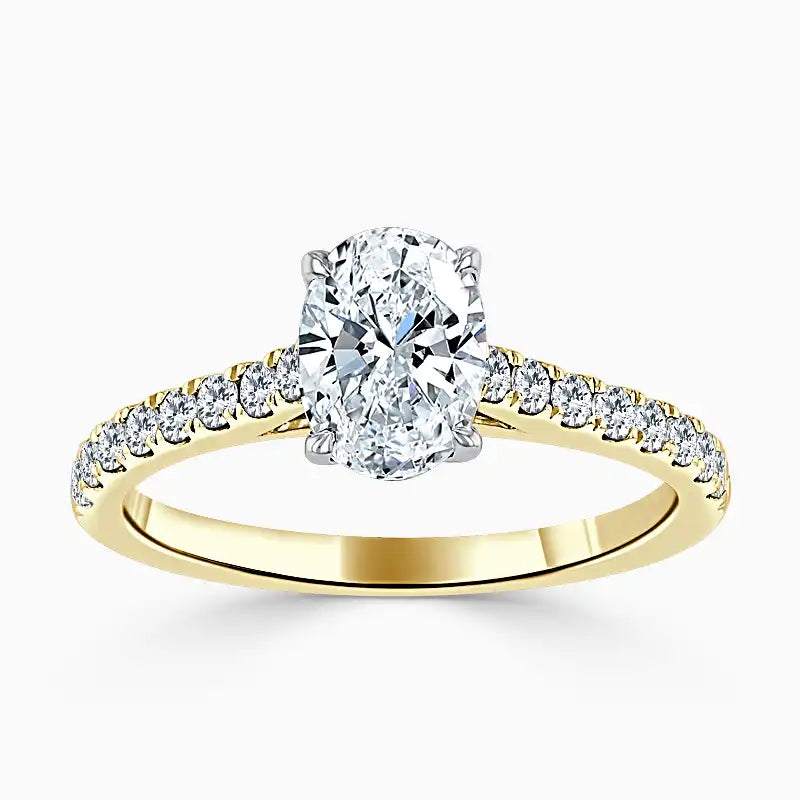 Hafeez Jewellery London Amber 18k yellow gold oval diamond side stone engagement ring - top view