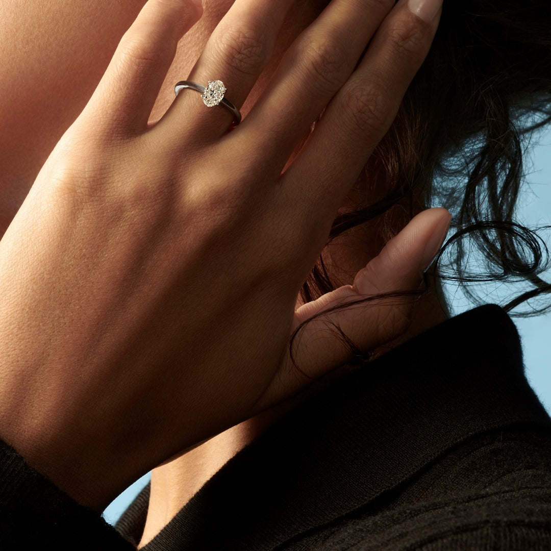Hafeez Jewellery London Musk 18k white gold oval diamond solitaire engagement ring - on hand model
