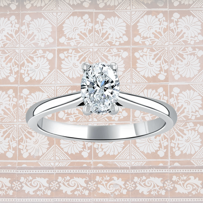 Hafeez Jewellery London Musk 18k white gold oval diamond solitaire engagement ring - pattern