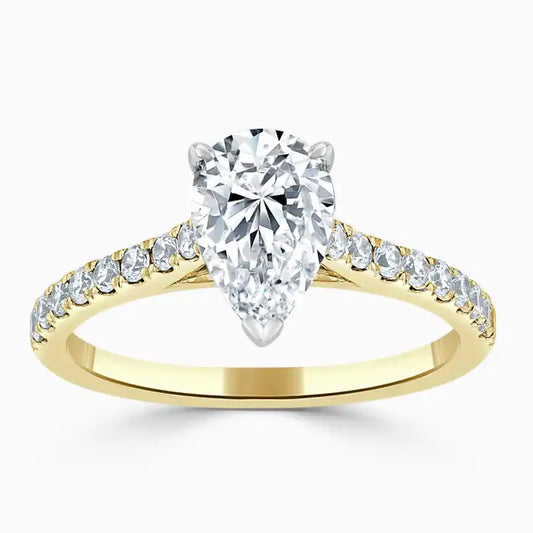 Hafeez Jewellery London Amber 18k yellow gold pear diamond side stone engagement ring - top view