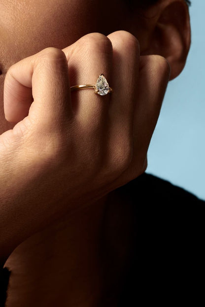 Hafeez Jewellery London Musk 18k yellow gold pear diamond solitaire engagement ring - on hand model