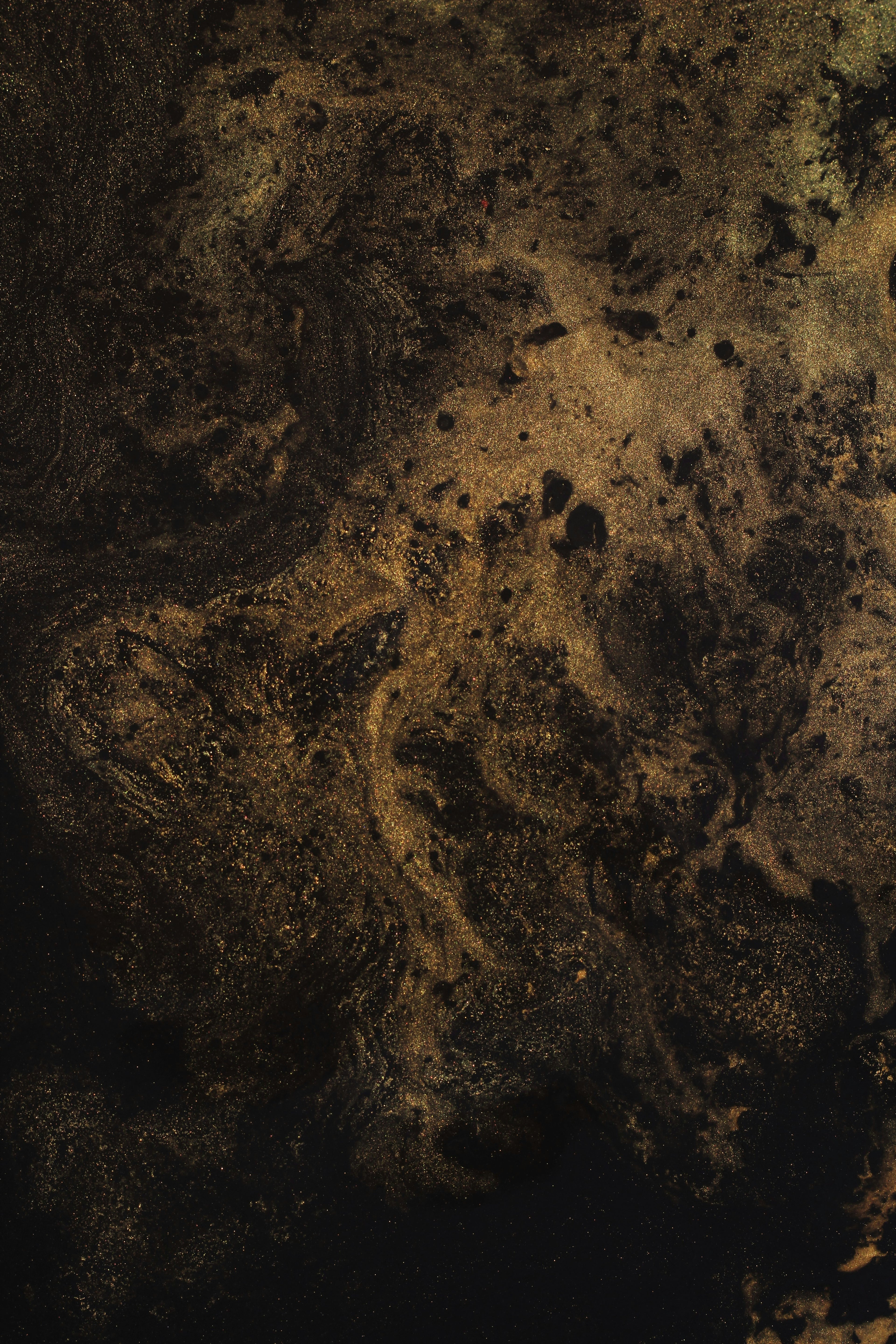 Textured golden surface with intricate patterns
