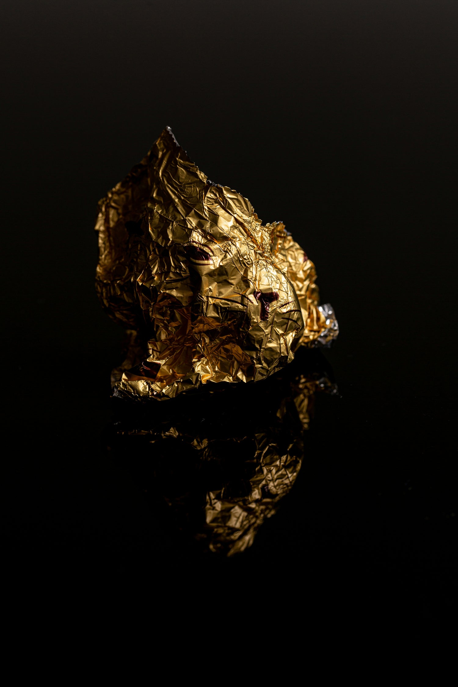 Gold nugget on a black background